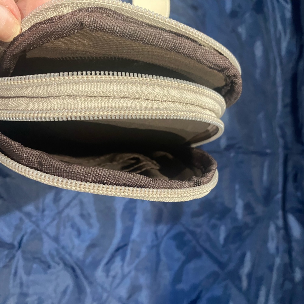 Small taupe belt bag.